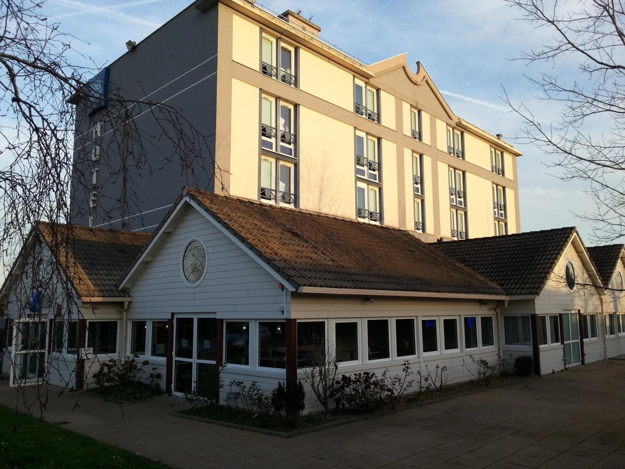 Hotel Ibis Budget Nantes Ouest Atlantis Coueron Exterior photo