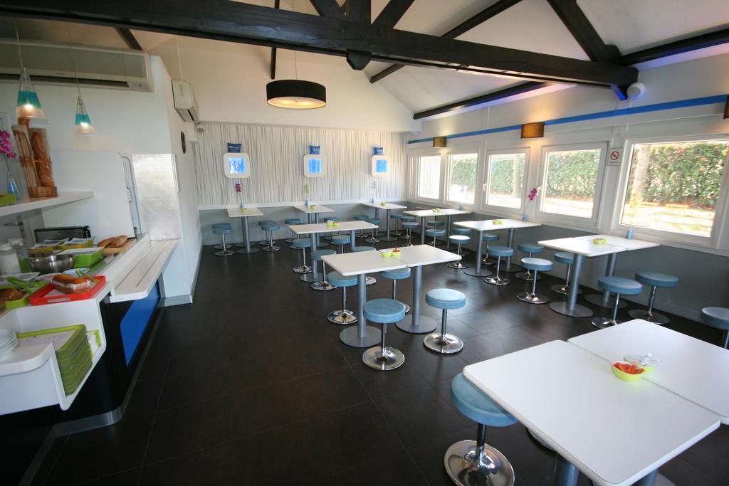 Hotel Ibis Budget Nantes Ouest Atlantis Coueron Exterior photo