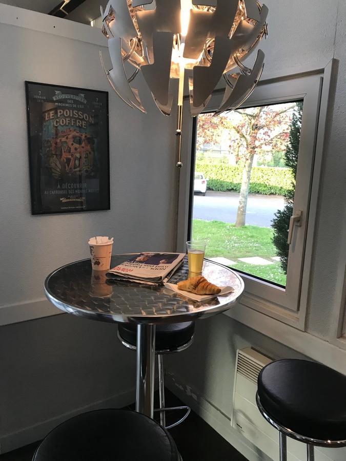 Hotel Ibis Budget Nantes Ouest Atlantis Coueron Exterior photo